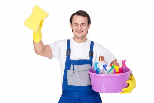 Cleaning technician reviewing service checklist before work